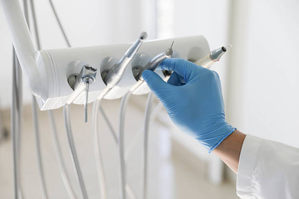 Professional Root Canal Treatment technician working in Raeford, NC